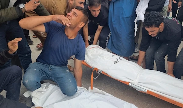 Mourners carry the bodies of members of the Abu Taha family who were killed in an Israeli airstrike, during their funeral at Al-Salam cemetery, Rafah, Gaza Strip, Palestine, April 29, 2024. (AP)