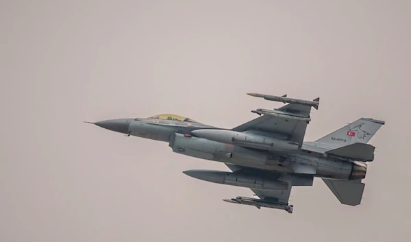 A Turkish Air Force F-16 military fighter jet flies at the end of an Air Policing exercise above eastern Romania, Wednesday, March 6, 2024. (AP Photo/Andreea Alexandru)