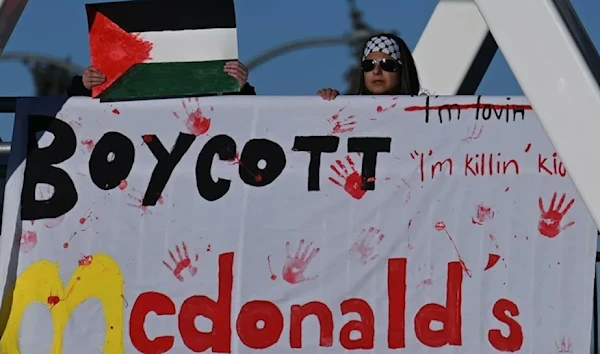 An anti-McDonald's banner held in a pro-Palestine rally (Social Media)