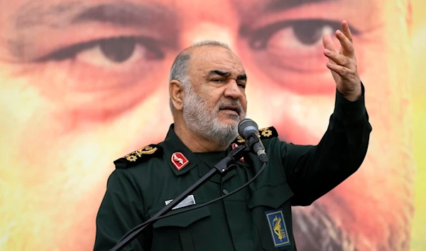 Chief of Iran's paramilitary Revolutionary Guard Gen. Hossein Salami addresses in front of the portrait of Seyed Razi Mousavi, a senior general of the guard, who was killed in an Israeli airstrike in Syria, Iran, Thursday, Dec. 28, 2023. (AP)