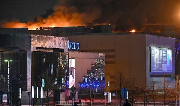 A massive blaze is seen over the Crocus City Hall on the western edge of Moscow, Russia, March 22, 2024. (AP)