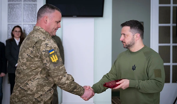 In this photo by the Ukrainian Presidential Press Office, Ukrainian President Volodymyr Zelensky, awards servicemen during his visit to Chernihiv region, Ukraine, Apr. 5, 2024. (AP)