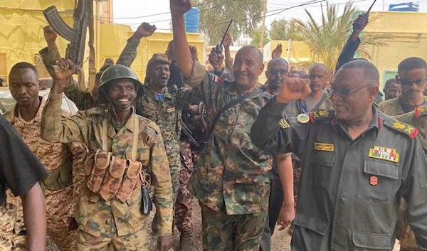 In this photo released by the Sudanese Army on Tuesday, May 30, 2023, Gen. Abdel-Fattah Burhan visits the troops in Khartoum, Sudan. (Sudanese Army via AP)