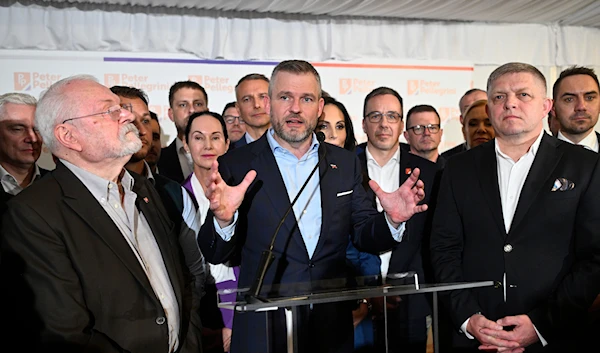 Presidential candidate Peter Pellegrini, centre, addresses supporters at his headquarters after a presidential runoff in Bratislava, Slovakia, Sunday, April 7, 2024. (AP)