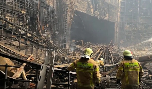 Saturday, March 23, 2024, firefighter work in the burned concert hall after an attack on the building of the Crocus City Hall on the western edge of Moscow, Russia (AP)