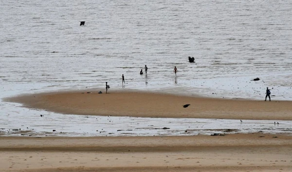 Children enjoy the beach in Maputo, Mozambique, Thursday, Sept. 5, 2019. (AP)