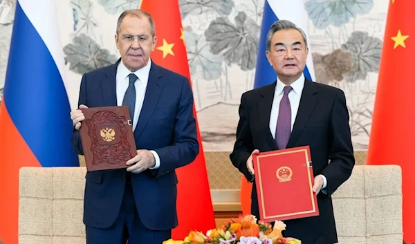 Following the negotiations in Beijing, Russian Foreign Minister Sergey Lavrov and Chinese Foreign Minister Wang Yi signed a plan for inter-Ministry of Foreign Affairs consultations for 2024 on April 8, 2024. (Russian Foreign Ministry via Telegram)