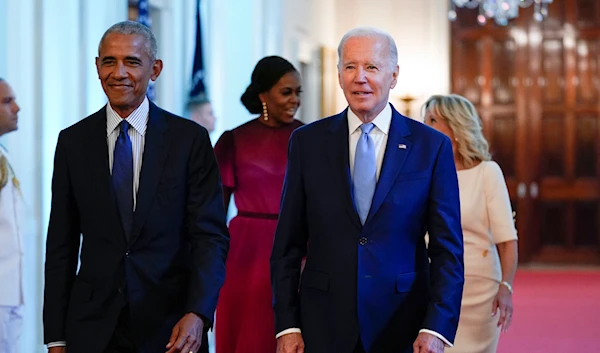 President Joe Biden and former President Barack Obama, followed by first lady Jill Biden and former first lady Michelle Obama, in the White House in Washington, Wednesday, Sept. 7, 2022 (AP)