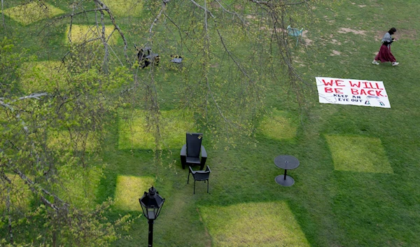 Squares mark a lawn where tents once stood after an encampment protesting the Israel-Hamas war was taken down at Brown University, Tuesday, April 30, 2024, in Providence, R.I. (AP)