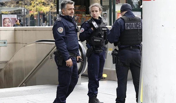 Illustrative: French police officers secure the Bibliotheque Francois Mitterrand RER and metro station on October 31, 2023. (AFP)