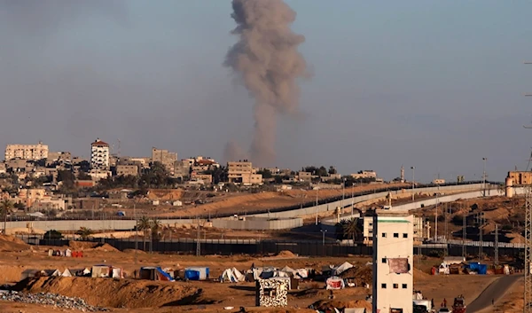 Smoke rises following an Israeli airstrike on buildings near the separating wall between Egypt and Rafah, southern Gaza Strip, Monday, May 6, 2024. (AP Photo/Ramez Habboub)