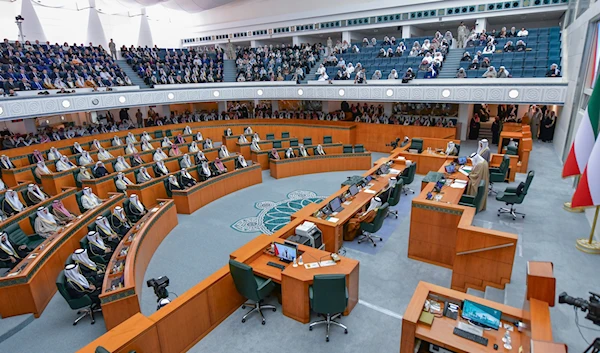 Members of parliament take part of the new Emir of Kuwait Sheikh Meshal Al Ahmad Al Sabah's oath ceremony at the National Assembly in Kuwait City, Kuwait, December 20, 2023 (AP)