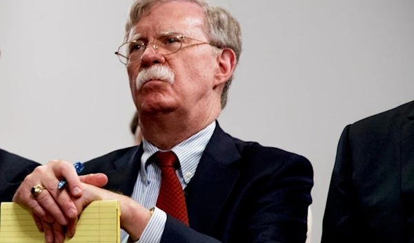 Then-National Security Adviser John Bolton attends a meeting with former President Donald Trump at the G-7 summit in Biarritz, France, Aug. 26, 2019. (AP)