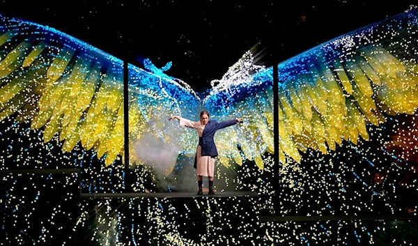 Alyosha from Ukraine performs as a show act during the first semi final at the Eurovision Song Contest in Liverpool, England, Tuesday, May 9, 2023 (AP Photo/Martin Meissner)