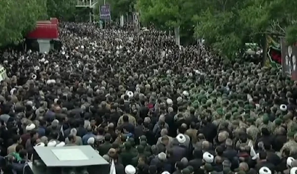 Mourners take part in a procession in Tabriz on May 21, 2024 (Iran Press/AFP)