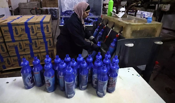 Illustrative: An employee working at Bishara Jubran's household products and cosmetics factory in the occupied West Bank city of Ramallah. (AFP)