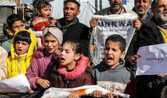 Illustrative: Palestinians demonstrate in Rafah in the southern Gaza strip calling for continued international support to UNRWA on January 30, 2024. (AFP)