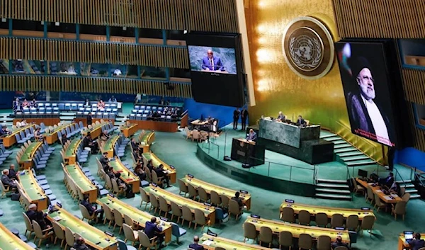 A picture of the late Iranian president Ebrahim Raisi is displayed as the UN General Assembly holds a tribute on May 30, 2024 © (AFP)