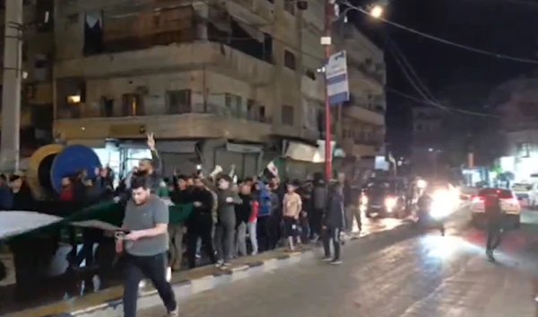 A screengrab showing protestors gather in an open sit-in against JTS' Abu Mohammad al-Jolani in Idlib, Syria, on May 5, 2024. (Social media)