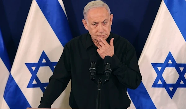 Israeli occupation Prime Minister Benjamin Netanyahu speaks during a press conference in Tel Aviv on October 28, 2023. (AP)