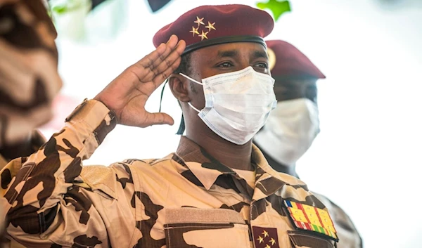 SMahamat Idriss Deby, head of the Transitional Military Council (CMT) salutes the coffin of the late Chadian president Idriss Deby during the state funeral in N'Djamena, Chad, Friday, April 23, 2021. (AP)