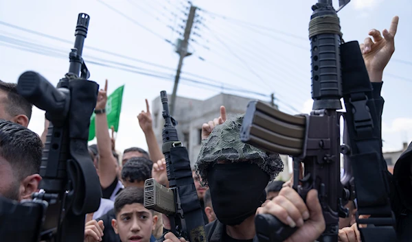 Palestinians take part in the funeral of Hamas local commander Mohammad Daraghmeh, 26, in the West Bank city of Tubas, occupied Palestine, April 12, 2024 (AP)