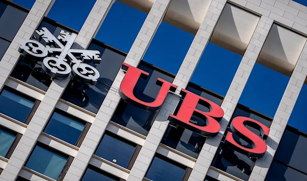 The logo of Swiss Bank UBS is fixed on a building where UBS have offices in Frankfurt, Germany, Tuesday, Nov. 8, 2022. (AP)