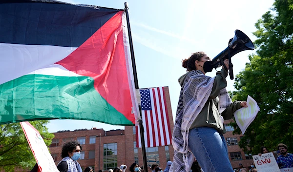 Demonstrators hold a mock trial on the campus of George Washington University in Washington, Friday, May 3, 2024, to protest the Israeli war on Gaza (AP)