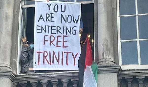 Protesters at Trinity College Dublin hold a sign in support of Palestine on May 6, 2024, in Ireland. (Social Media)