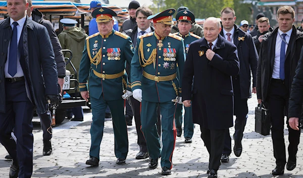 Commander-in-Chief of the Russian Ground Forces Oleg Salyukov, Russian Defense Minister Sergei Shoigu, and Russian President Vladimir Putin leave Red Square after the Victory Day military parade in Moscow, Russia, Thursday, May 9, 2024. (AP)