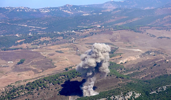 Smoke rises from an Israeli airstrike on the Mahmoudieh mountain, as seen from Marjayoun town, south Lebanon, on September 24, 2024. (AP)