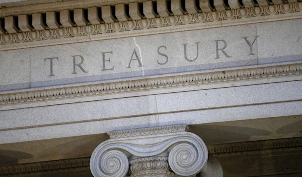 This photo shows the U.S. Treasury Department building at dusk in Washington, June 6, 2019. (AP Photo/Patrick Semansky, File)