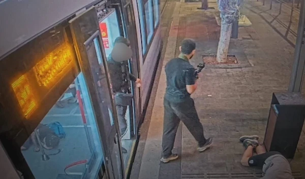 CCTV footage shows an armed shooter amid the shooting operation in Tel Aviv, Oct. 1, 2024 (Social Media)