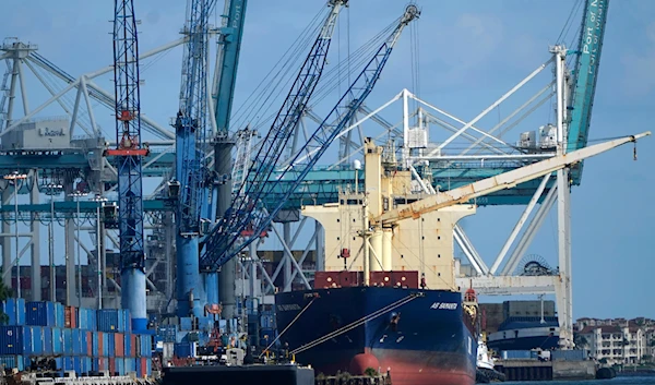 A container ship is docked at PortMiami, on October 19, 2021, in Miami. (AP)