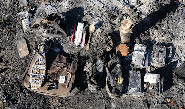 Burnt clothing, backpacks, phones, passports, and other personal belongings were photographed on the Croatian border. (No Name Kitchen)