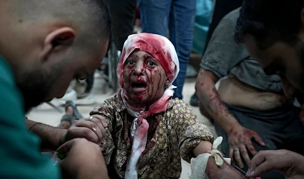 A Palestinian child wounded in the Israeli bombardment of the Gaza Strip is treated at a hospital in Deir al-Balah, Thursday, Oct. 10, 2024. (AP Photo/Abdel Kareem Hana)