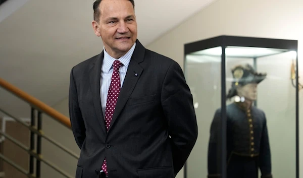 Polish Foreign Minister Radosław Sikorski waits for the arrival of U.S. Secretary of State, Antony Blinken for a talks in Warsaw, Poland, Thursday, Sept. 12, 2024. (AP)