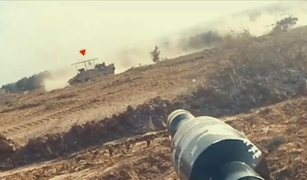 Palestinian Resistance factions destroy an Israeli APC in Beit Lahia, northern Gaza Strip, occupied Palestine, in an undated screengrab (Resistance Military Media)