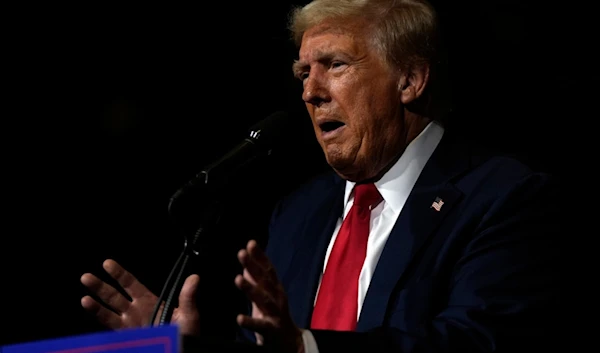 Republican presidential nominee former President Donald Trump speaks at a campaign rally at Grand Sierra Resort and Casino, Friday, Oct. 11, 2024, in Reno, Nev. (AP)