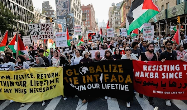 pro-Palestinian protesters march through Manhattan, Monday, October 7, 2024, in New York. (AP)