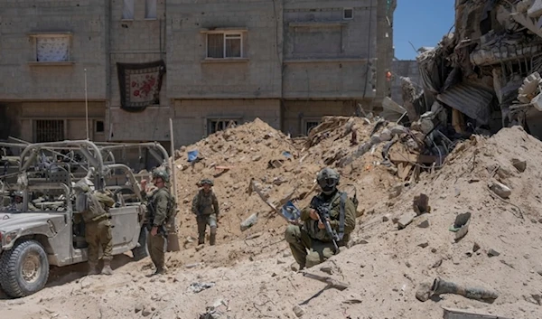 Israeli soldiers gather in the southern Gaza Strip, on Wednesday, July 3,2024. (AP)