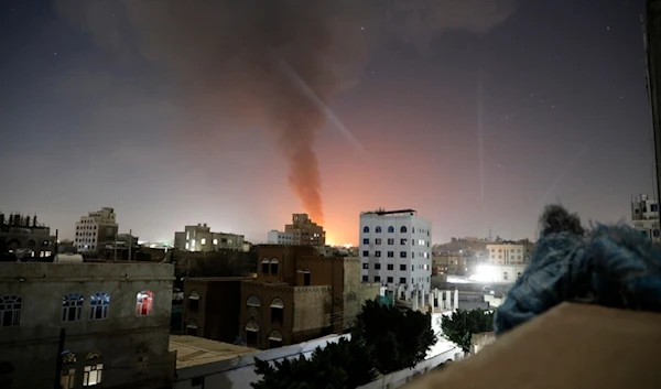 Smoke rises after the US-UK-led airstrikes on hit targets in Sanaa, Yemen, Sunday, Feb. 25, 2024. (AP)