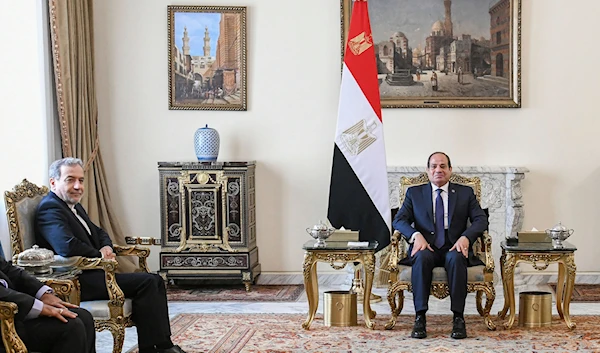 In this photo provided by Egypt's presidency media office, Egyptian President Abdel-Fattah el-Sissi, right, meets with Iranian Foreign Minister Abbas Araghchi, at the Presidential Palace in Cairo, Egypt, on October 17, 2024. (AP)