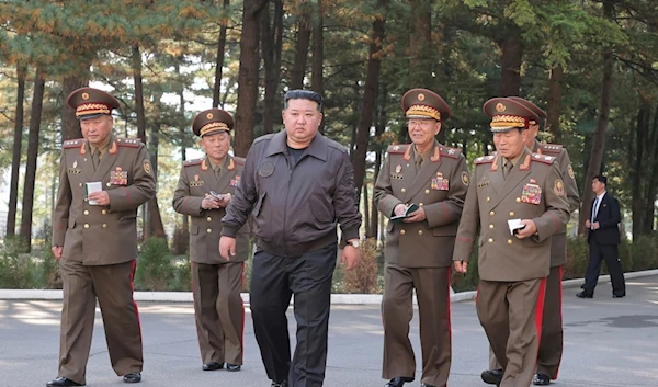 In this photo provided by the DPRK government, North Korean leader Kim Jong Un, center, visits the headquarters of the People’s Army’s 2nd Corps at an undisclosed place in DPRK Thursday, Oct. 17, 2024 (AP)