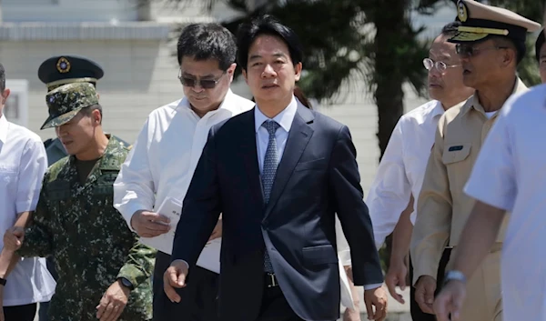 Taiwan President Lai Ching-te, center, listens to a briefing during his visit to inspect Taiwanese navy on the outlying Penghu Island, Taiwan, Sept. 6, 2024. (AP)