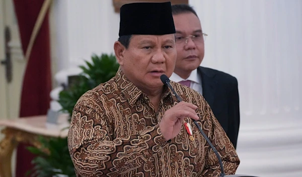 Indonesia's new President Prabowo Subianto speaks s he announces his cabinet lineup at Merdeka Palace in Jakarta, Indonesia, Sunday, Oct. 20, 2024. (AP Photo/Achmad Ibrahim)