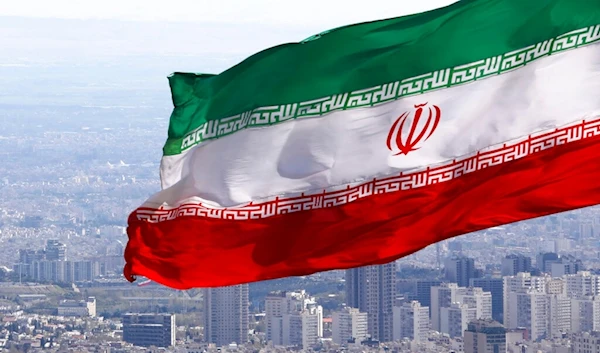 Iran's national flag waves in Tehran, Iran, March 31, 2020. (AP)