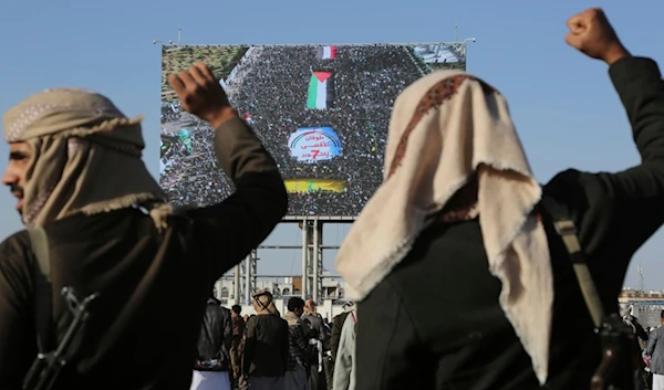 Yemenis shout slogans during a rally to commemorate the one-year anniversary of the war in the Gaza Strip, in Sanaa, Yemen, October 7, 2024 (AP)