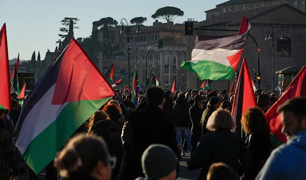 Protesters gather during a rally in support of the Palestinians in Rome, on January 13, 2024. (AP)