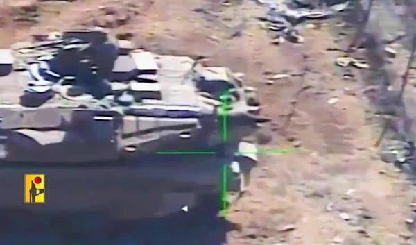 Screengrab of footage released by Hezbollah showing the targeting of a Merkava tank along the Lebanese border on October 19, 2024. (Resistance media)